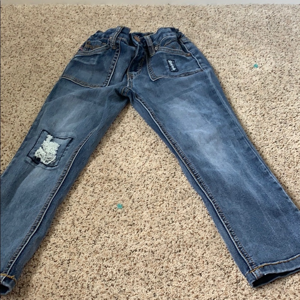 Patched ripped capre jeans